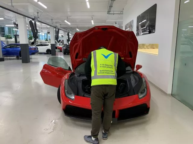 Last Check Inspector Working On A Ferrari GTB Sydney NSW